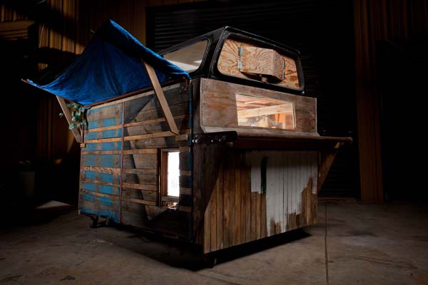 Amazing Artist Goes Dumpster Diving, Builds Homes for the Homeless
